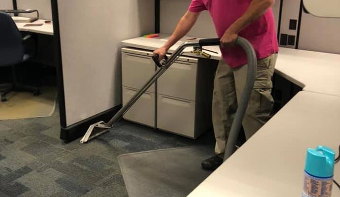 Commercial carpet cleaning with vacuum cleaner