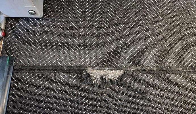 Ripped carpet