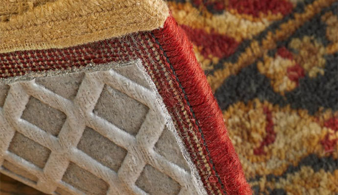 An installed rug pad