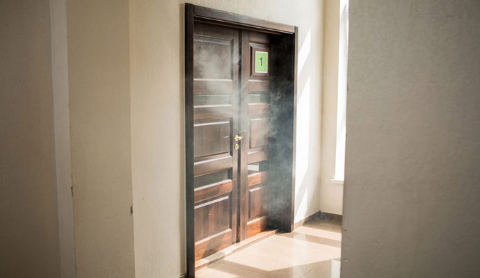 Smoke coming out of a room