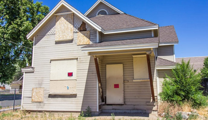 Boarded up house