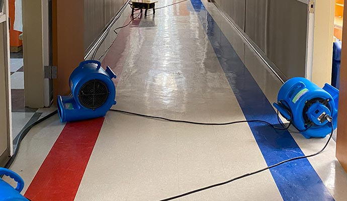 Water damage restoration with equipment